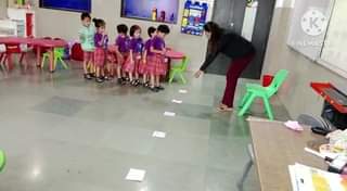 Happy Kids Reflecting upon number recognition.
