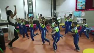 Grade 1 while doing garba dance straight from our classroom at Omkar Cambridge International School.