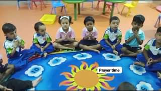 Prayer time in early year’s class.